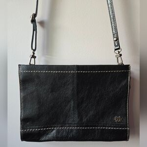 The Sak Patterned Fabric Interior with Brown Accents